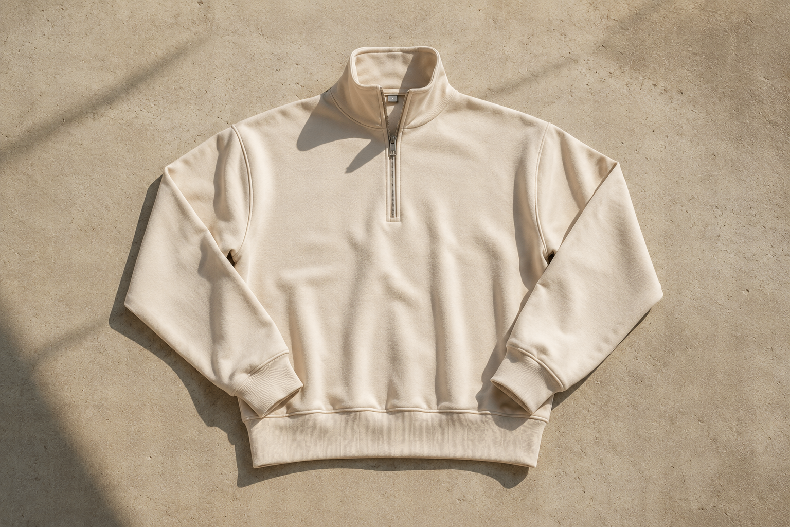 Garment flat-lay on concrete